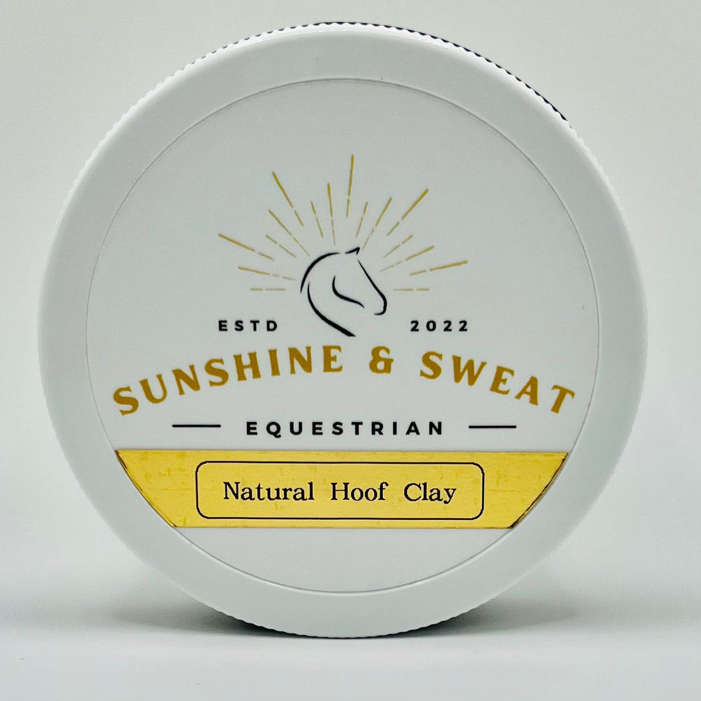 Natural_Hoof_Clay white jar with gold label