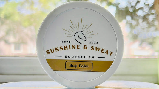 Bug_Balm White jar with white and gold label, one jar stacked on two jars